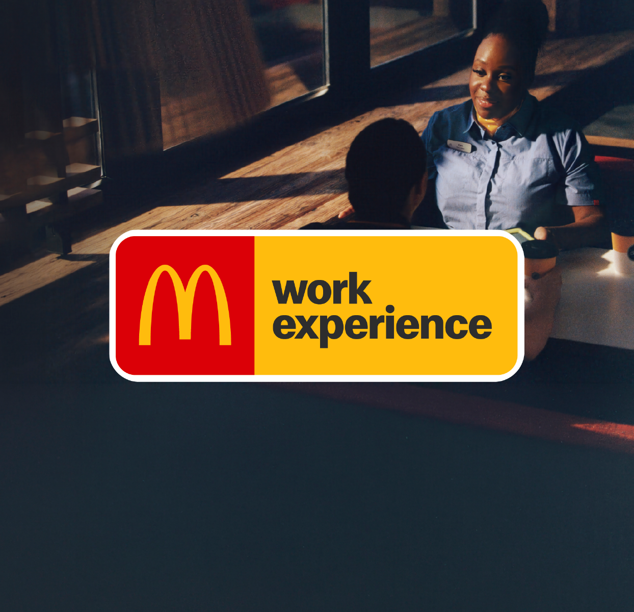 McDonald's Work Experience logos and woman sat in a darkened space in her McDonald's uniform.